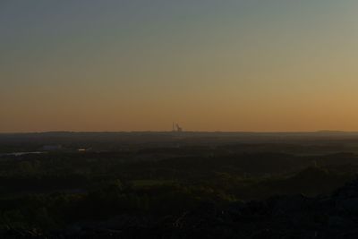 Scenic view of silhouette landscape against sky during sunset