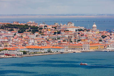 Panorama of lisbon old town seen from the viewpoint at cristo rei, lisbon, portugal