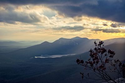 Scenic view of mountains against dramatic sky