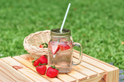 Close-up of strawberries in basket on table