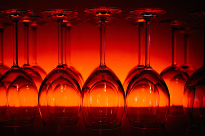 Close-up of empty wineglasses in darkroom