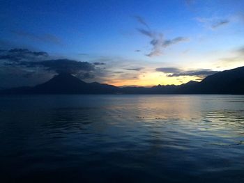 Scenic view of mountains at sunset