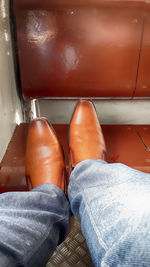 Low section of woman wearing high heels