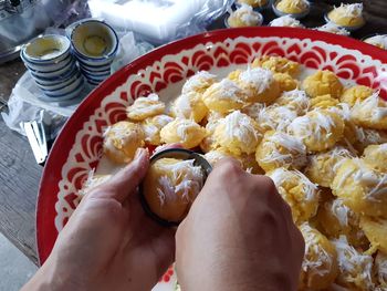 Close-up of person holding food