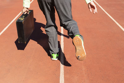 Low section of man running