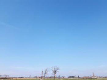 Scenic view of landscape against clear blue sky