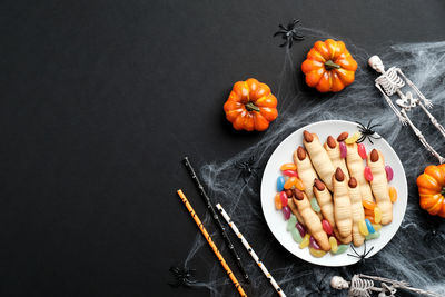 High angle view of fruits in plate on table