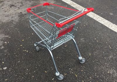 High angle view of shopping cart on street