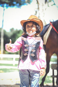 Portrait of girl wearing hat