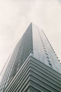 Low angle view of modern building against sky