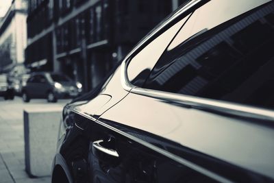 Close-up of car on side-view mirror