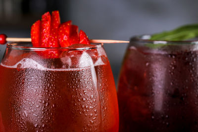 Close-up of red wine in water