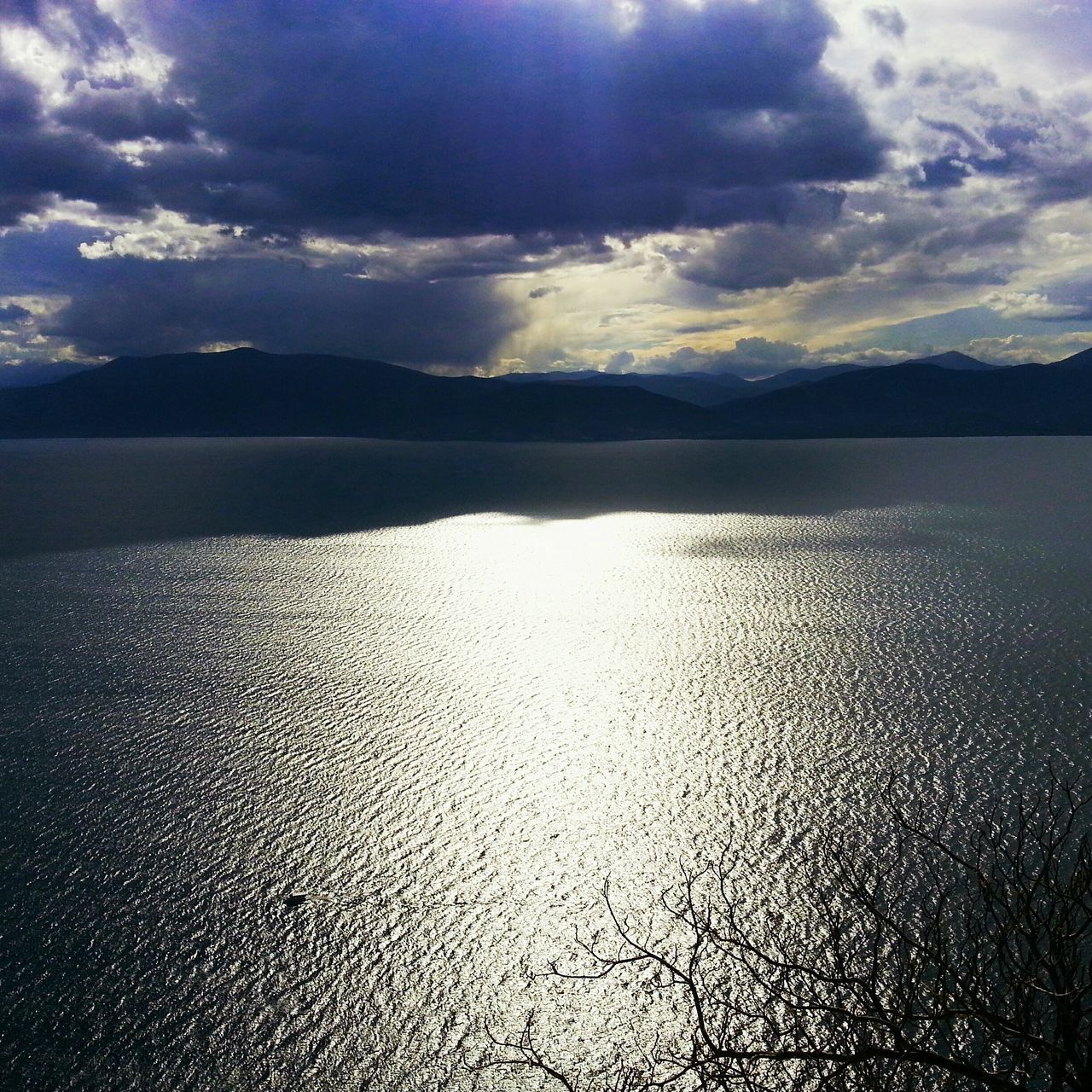 water, sky, tranquil scene, scenics, tranquility, beauty in nature, cloud - sky, sea, nature, mountain, cloud, reflection, beach, idyllic, cloudy, sunset, lake, shore, calm, dusk