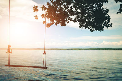 Scenic view of swimming pool by sea against sky