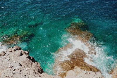 High angle view of rocky shore