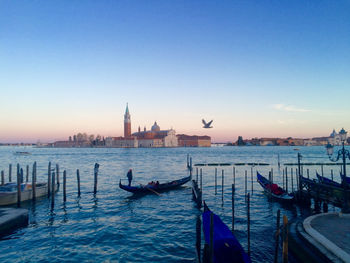The sun is setting on another beautiful day in venice, italy . 