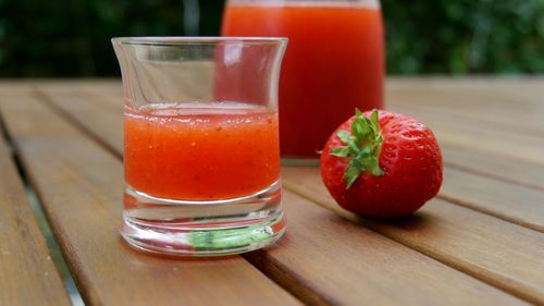 Close-up of juice in glass on table