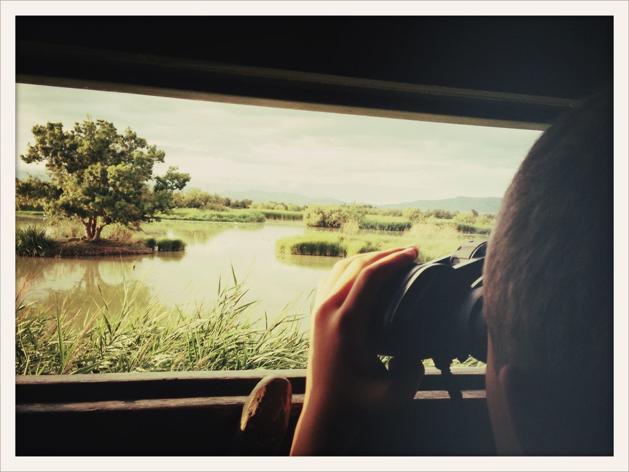 water, sky, auto post production filter, transfer print, lake, tree, leisure activity, lifestyles, sitting, reflection, river, relaxation, rear view, person, nature, men, window, transportation