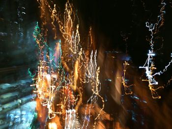 Close-up of illuminated water at night