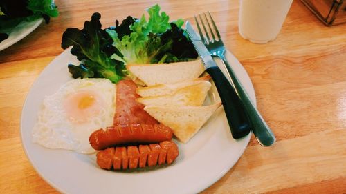 Close-up of breakfast served on table