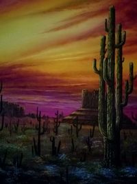 Cactus growing on field against dramatic sky during sunset