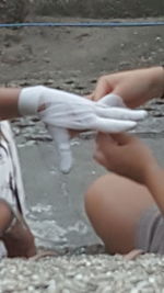 Low section of child on beach