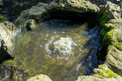 High angle view of river amidst rock formation