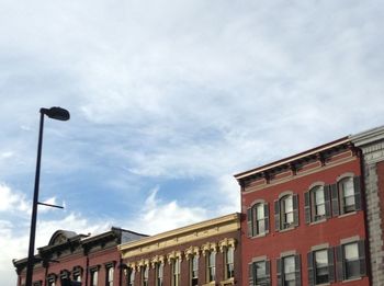 High section of building against cloudy sky