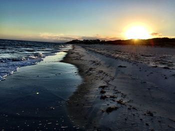 Scenic view of sea at sunset