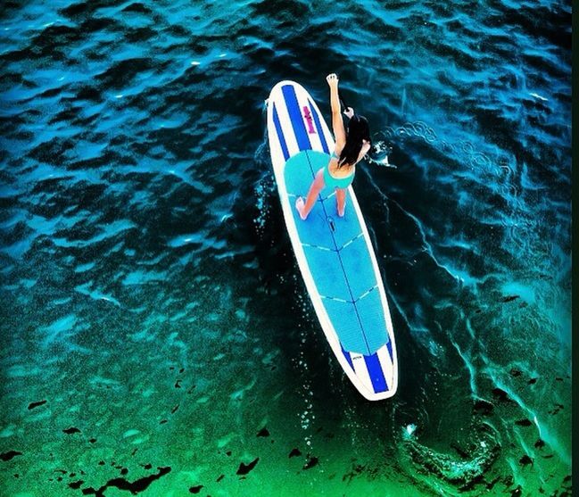 water, nautical vessel, boat, transportation, blue, high angle view, mode of transport, sea, rippled, waterfront, moored, oar, lake, day, no people, multi colored, outdoors, patriotism, rope, toy