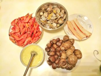 High angle view of fruits in plate on table