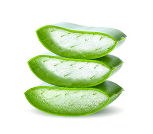 Close-up of bananas against white background