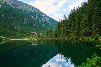 Mountains range near beautiful lake. tatra national park in poland. morskie oko or sea eye lake