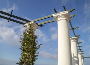 Low angle view of statue against sky