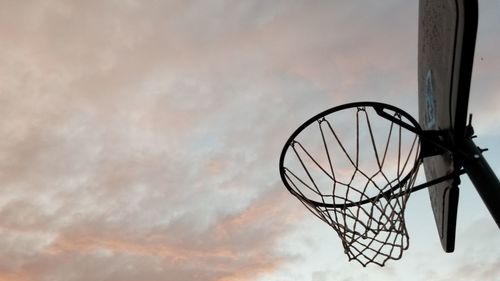 Low angle view of basketball hoop against sky