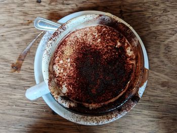 High angle view of coffee in cup on table