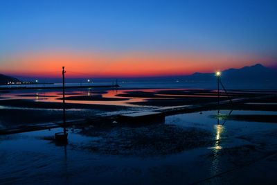 Scenic view of sea against sky at sunset