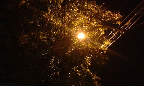 Low angle view of illuminated street light