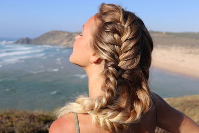 Portrait of woman with braids