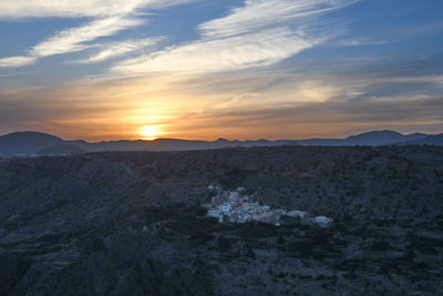 Scenic view of mountains against sky during sunset