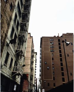 Low angle view of buildings against clear sky