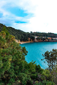 Scenic view of bay against sky