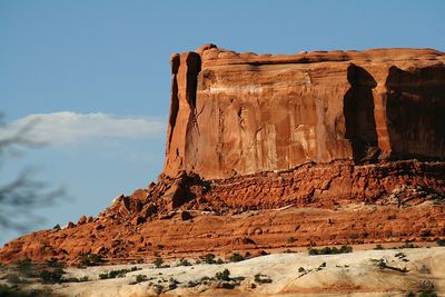 Landscape against rocky mountains