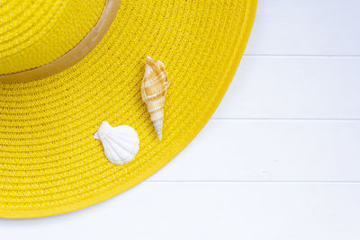 High angle view of yellow slices on table