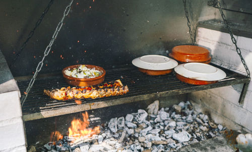 Close up shot of a mediterranean bbq barbecue grill full with fresh meat and healthy vegetarian food