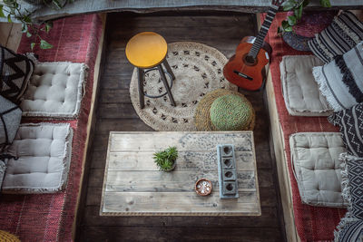 High angle view of guitar on table