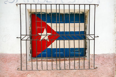 Red flag on wall of building