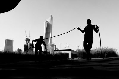 Full length of woman standing in city