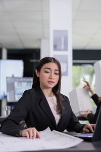 Businesswoman working at office