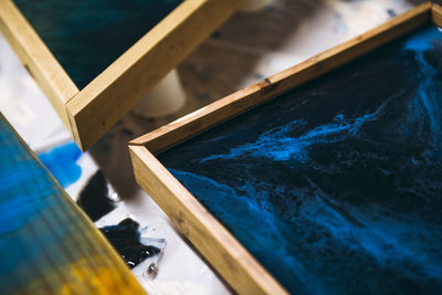 Details and blue marbling of new resin artwork drying